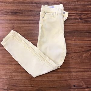 Pale yellow Gap skinny jeans
